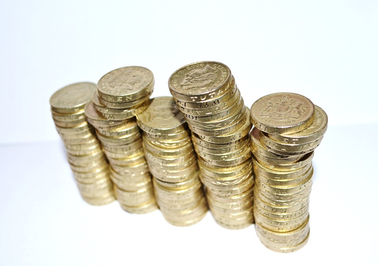 coins stacked on a white background